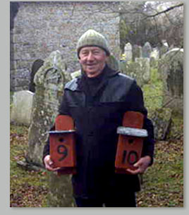 Bob Stockhausen putting out the new bird boxes